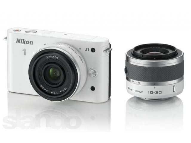 Nikon 1: знакомство с принципиально новыми системными камерами v1 и j1